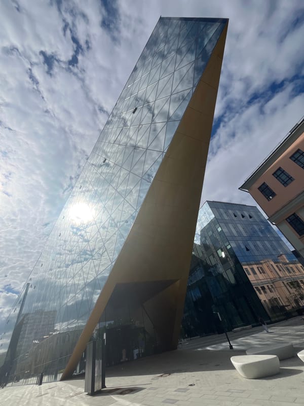Glass and gold architecture at a math-themed modern complex