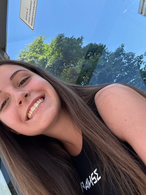 Waiting at a Burgas bus stop, selfies and a Lidl bag in hand