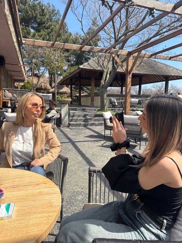 Women photographed with decorative handbag in Varna, Bulgaria