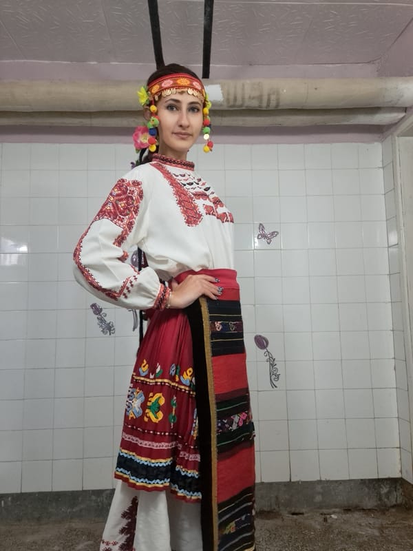 Traditional Bulgarian folk costume performance observed in Lokorsko