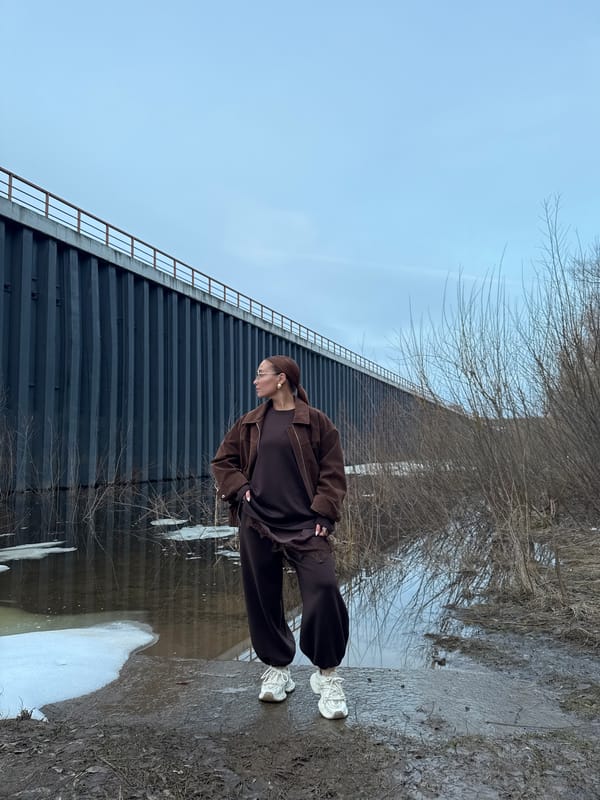 Woman spotted by water near structure in Chaikovsky, Russia