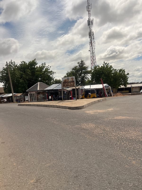 Daily street life documented across Jalingo, Nigeria during midday