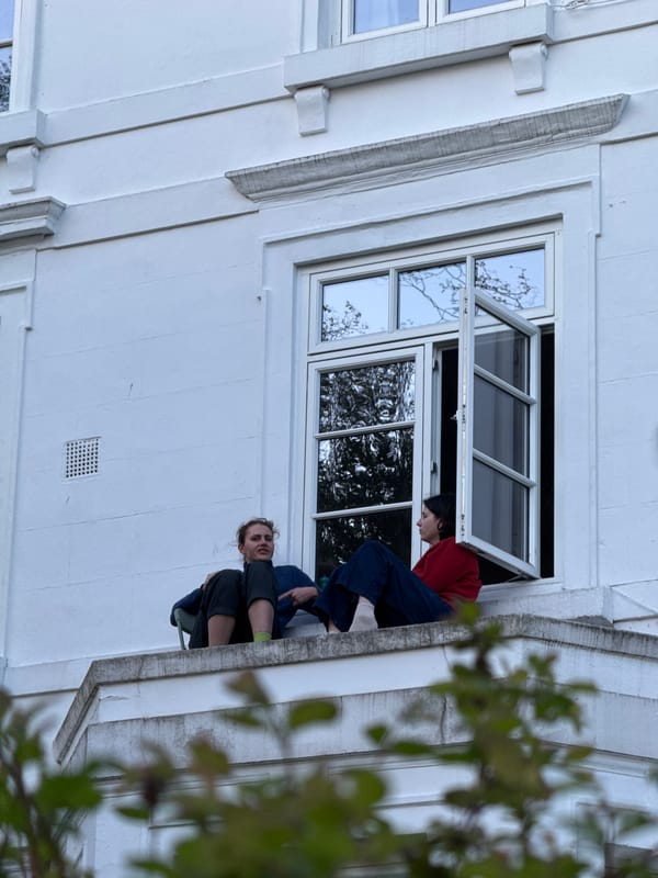 Two people spotted at London building window near academy