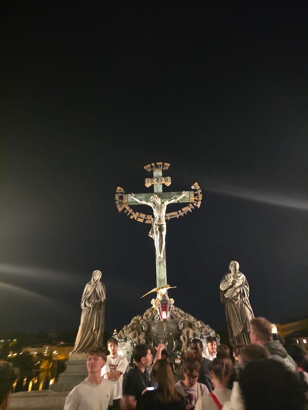 Nighttime documentation of St. Nicholas Church Prague religious statuary