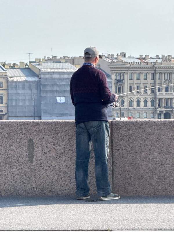 Afternoon activity along Saint Petersburg's Fontanka River embankment