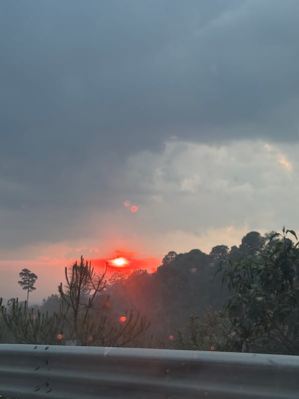 Sunset landscape photographed from vehicle near Chalco, Mexico