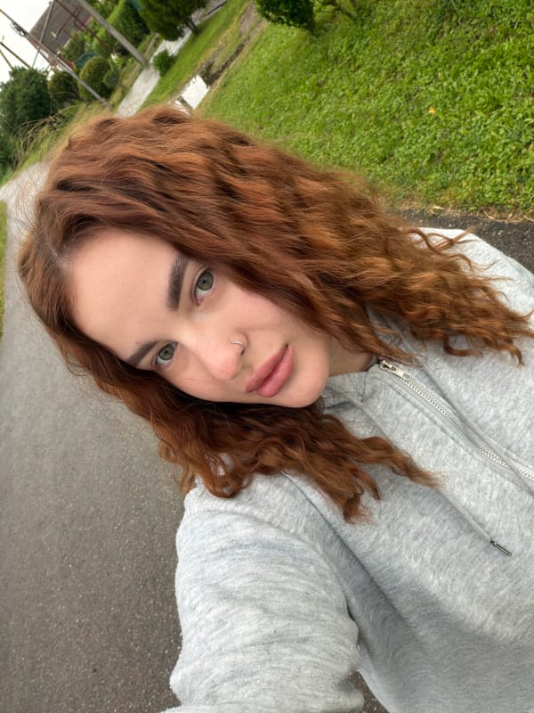 Woman documents afternoon outing with selfies in Novopokrovskaya, Russia