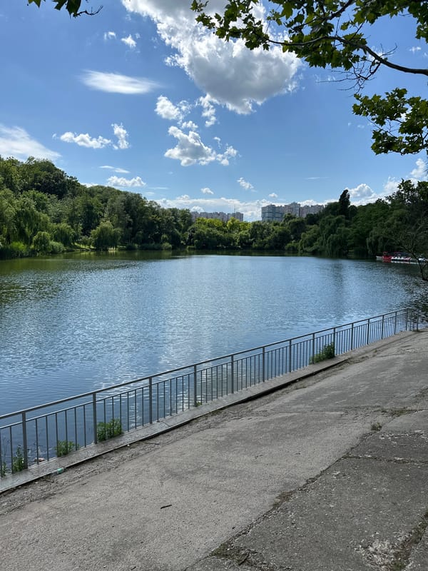 Midday in a Chișinău park: lake, wildlife, and quiet pathways