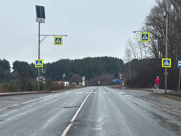Wet roads and winter scenery observed in Rusalevka, Russia
