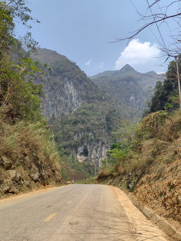 Mountain landscape captured along roadway in rural Vietnam