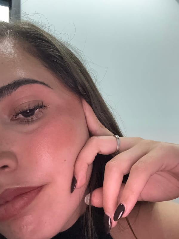 Woman observed in contemplative moments at desk in Mexico