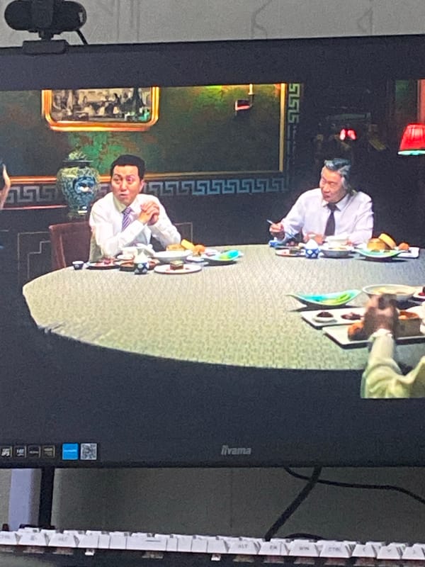 East Asian drama footage viewed on screens in Poznań