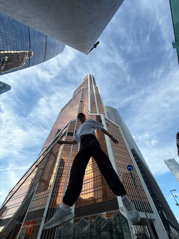 Jumps and gatherings in a Khimki plaza below glass towers
