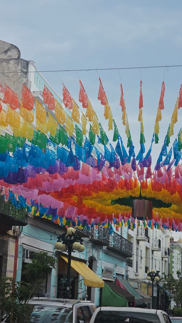 Festive Puebla streets decorated with traditional papel picado banners