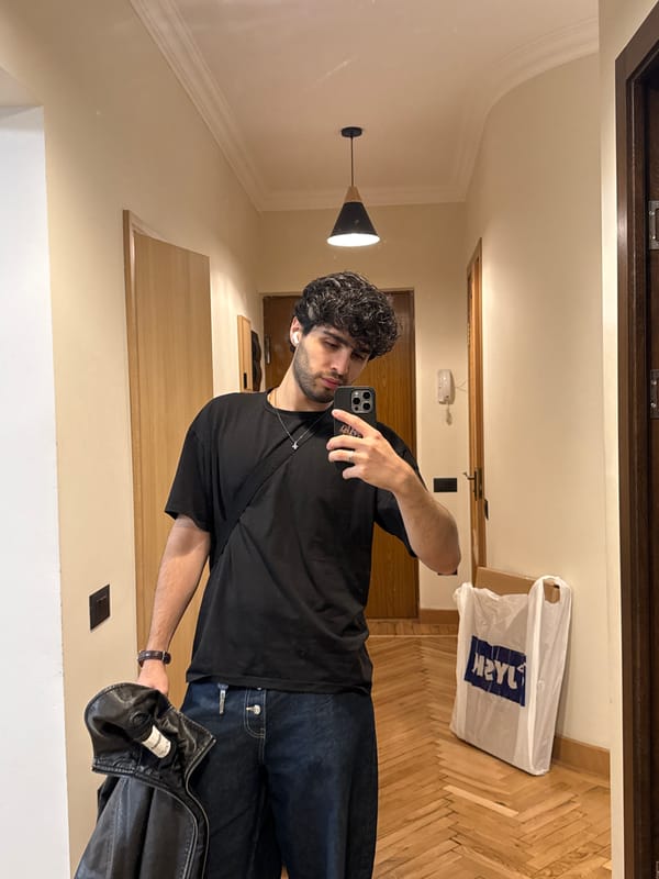 Man takes selfie in hotel hallway in Yerevan