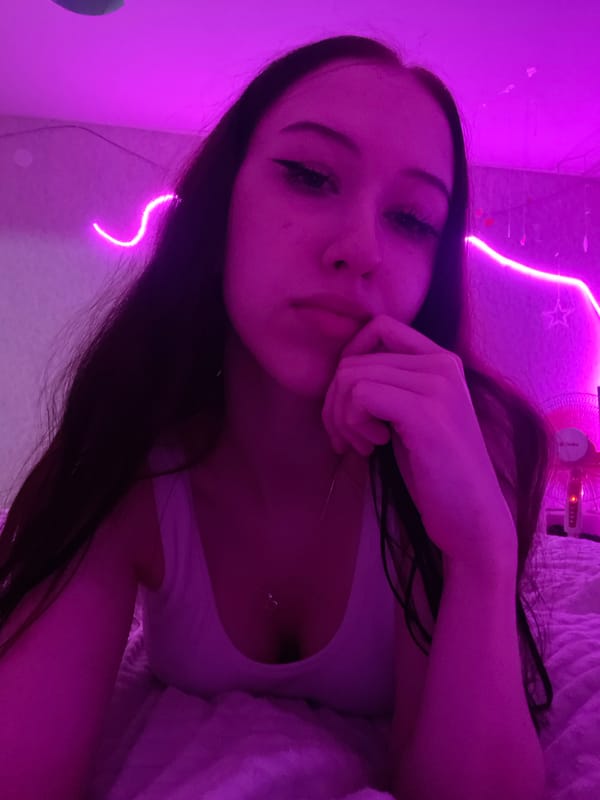 Evening selfie session with neon lighting and cat in Votkinsk