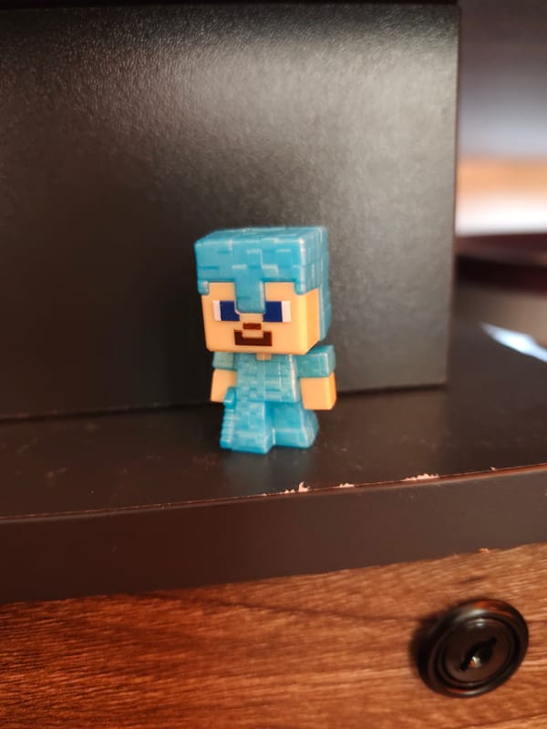 Blue-armored Minecraft figure spotted on Sofia shelf
