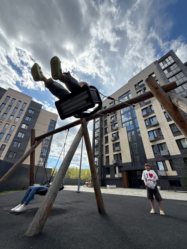 Morning playground activity in Rusanovo draws children and families