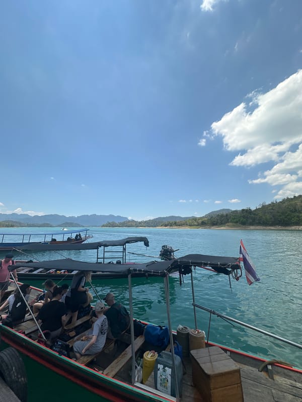 Morning boat tour and fish feeding at Cheow Lan Lake