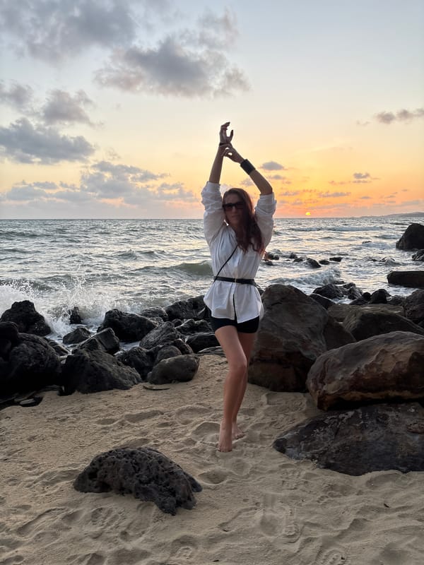 Sunset selfies and seascape shots on a rocky beach