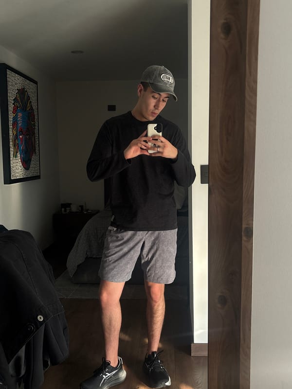 Young man takes mirror selfie in San Bernardino Tlaxcalancingo