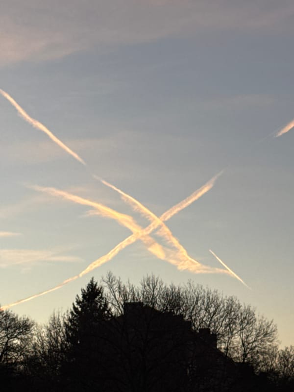 Intersecting contrails observed over Sofia, Bulgaria at 5:00 PM