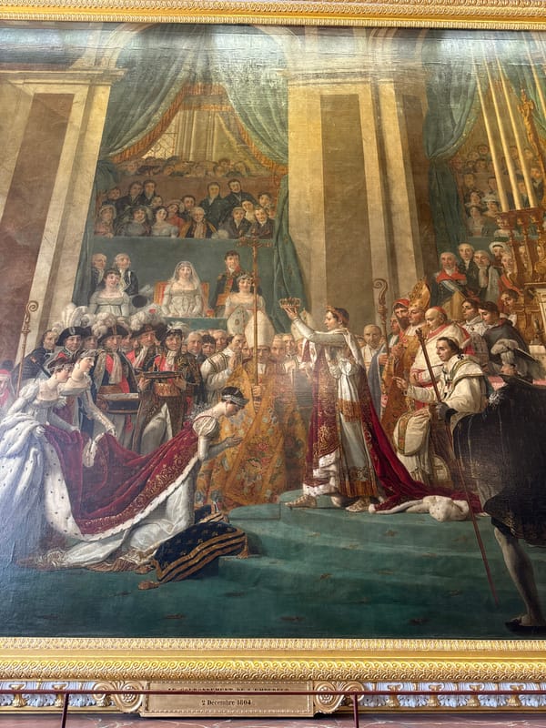 Tourist photographs Napoleon coronation painting at Versailles Palace