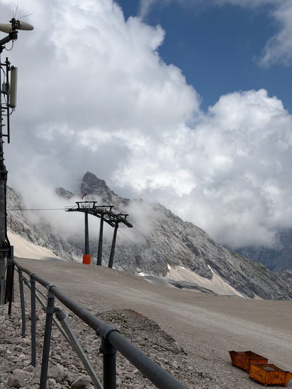 Snow groomers and heavy equipment at a Garmisch-Partenkirchen mountain site