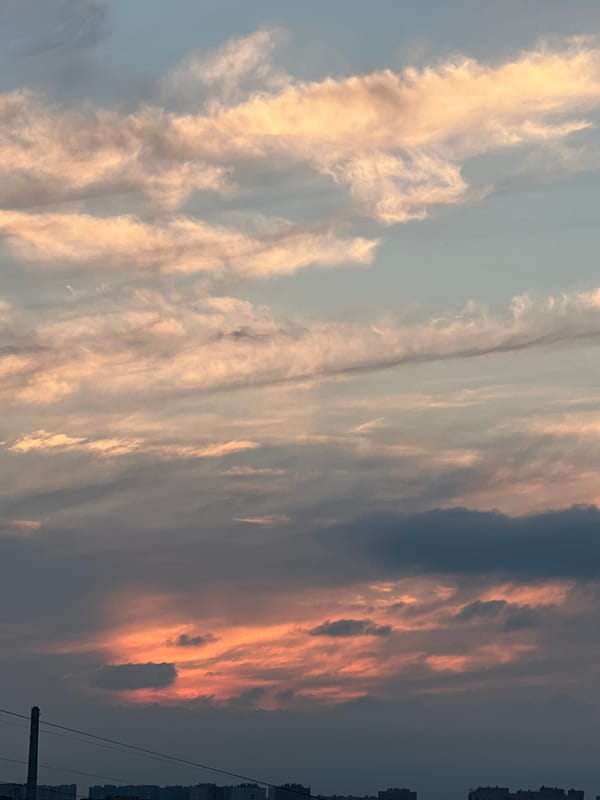 Dusk skies and rooftops over Sinyavino, Russia