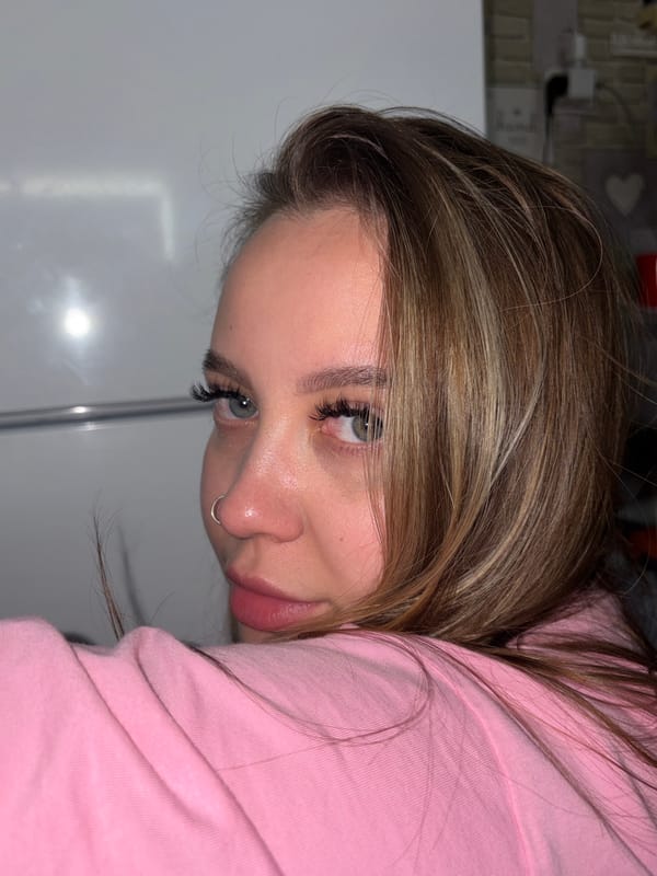 Woman Takes Multiple Selfies During Evening Photo Session in Russia