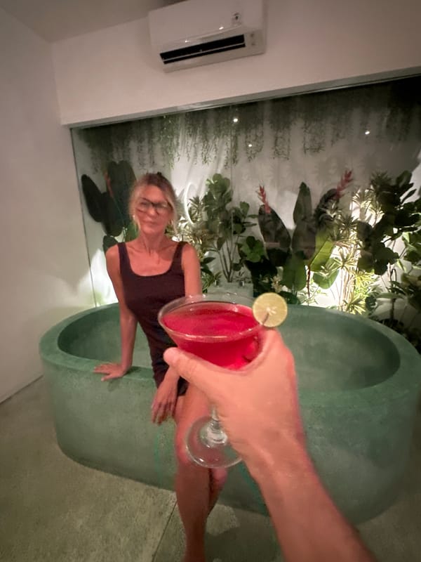 Couple enjoys morning at tropical-themed wellness lounge in Bali