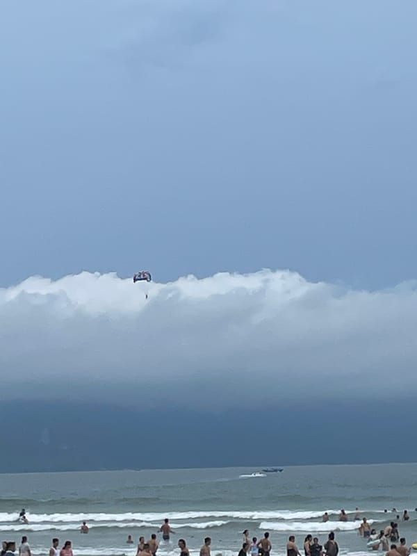 Busy morning at My Khe Beach and Da Nang streets
