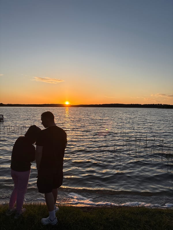 Sunset gathering draws witnesses to Kownatki lakeside in Poland