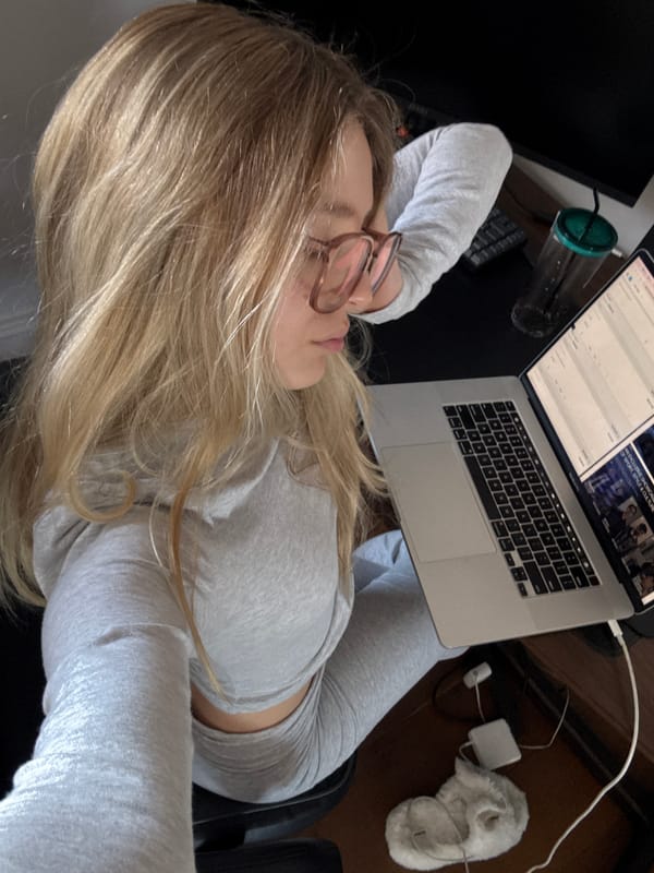 Woman works on laptop in office chair, Mexico City