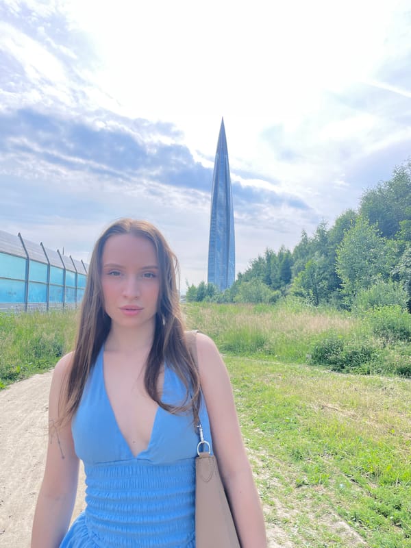Afternoon photos near a Saint Petersburg spire, summer 2026.