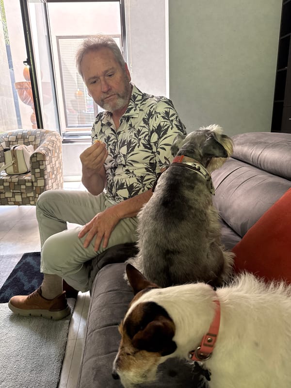 Older man seated by window in Huixquilucan home