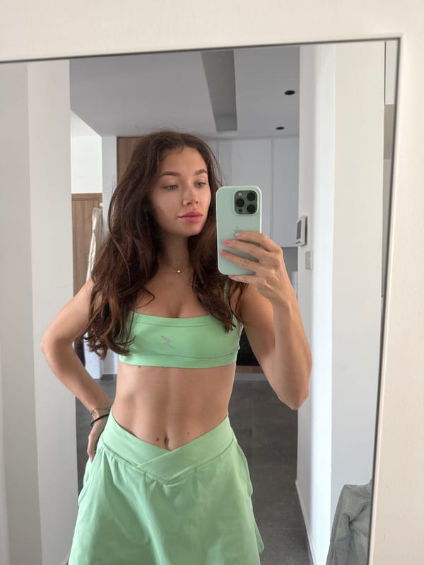Woman takes mirror selfies in Larnaca, Cyprus
