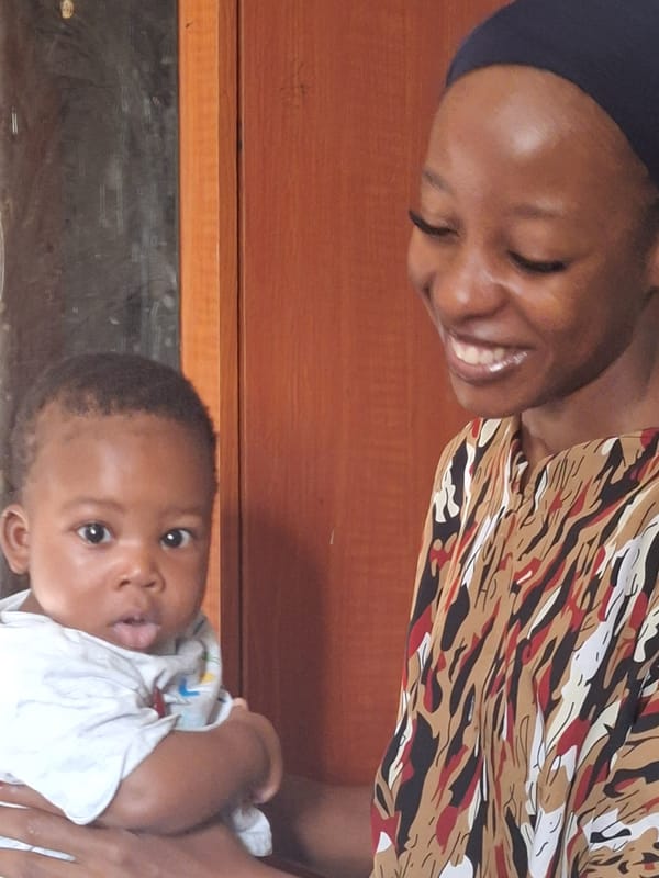 Mother and baby photographed in Yelwa, Nigeria