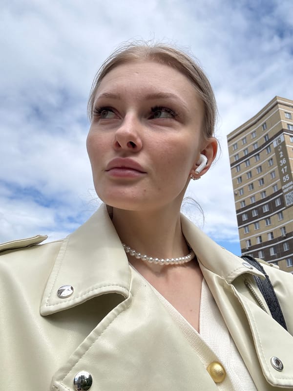 Woman documents morning journey through Perm with selfies, street scenes