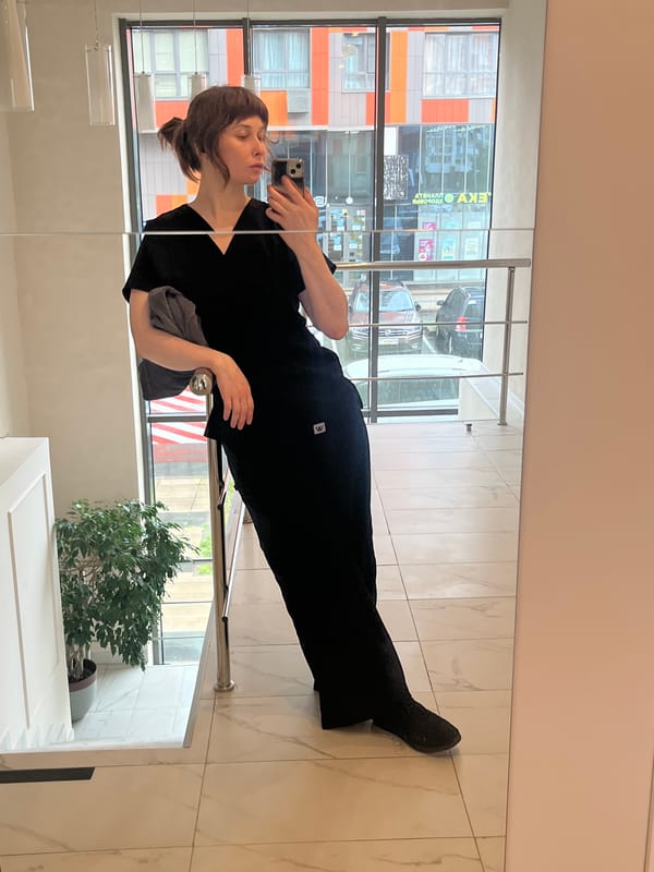 Mirror selfies in black scrubs, Moscow morning