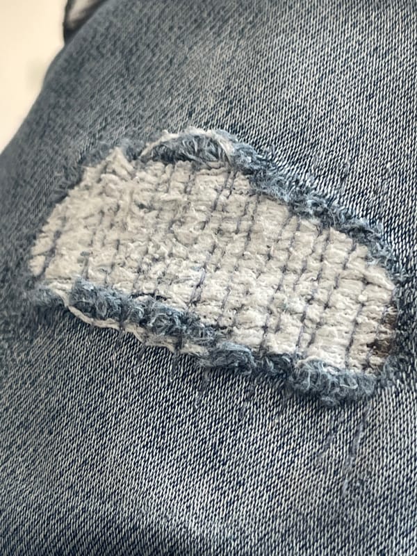 Patched jeans and a Roblox menu, captured seconds apart