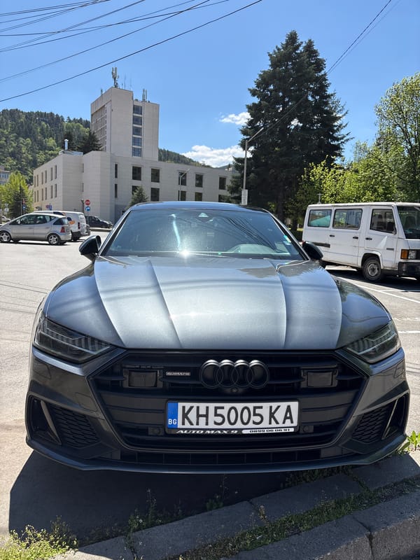 Child plays with toy car on Kyustendil street