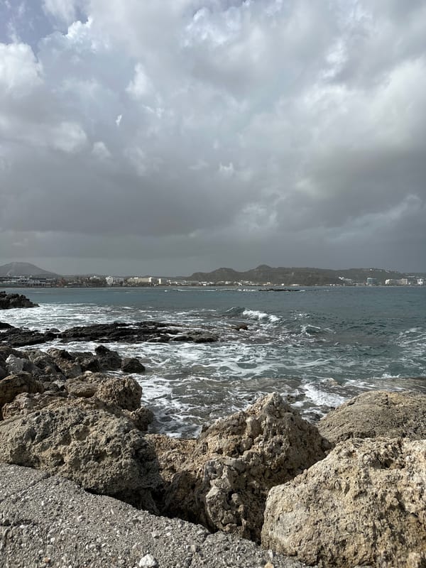 Cloudy day documented along rocky Faliraki coastline in Greece