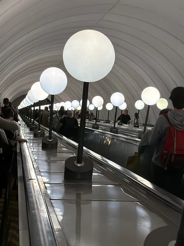 Everyday commuter scenes around a Moscow metro station