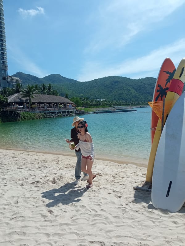 Afternoon beach stroll with coconuts, Nha Trang shoreline.