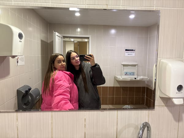 Late-night travelers documented at Izhevsk train station with luggage