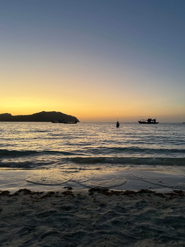 Dusk settles over a Ko Pha-ngan beach, water and all