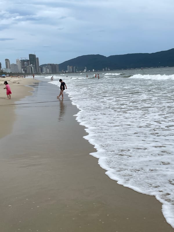 Cloudy morning at My Khe Beach, coffee and surf in Đà Nẵng