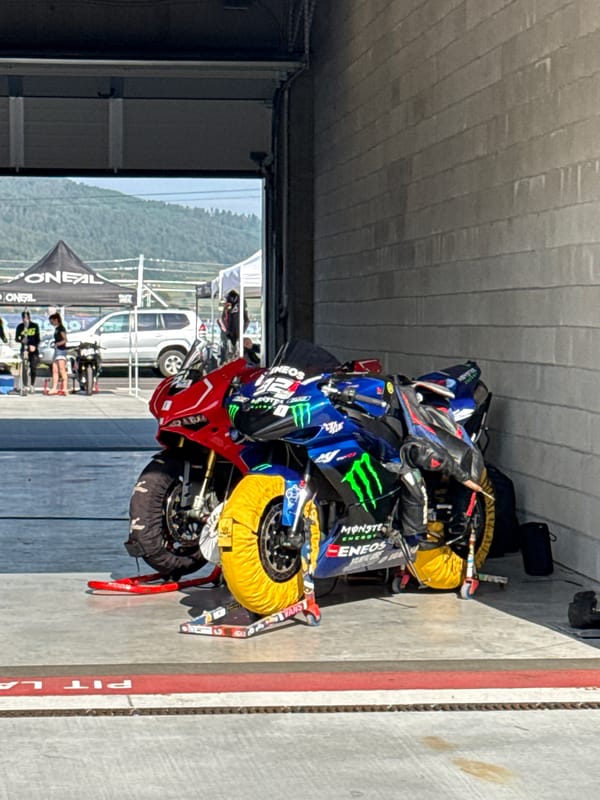 Racing event pit lane activity captured in Dospey, Bulgaria