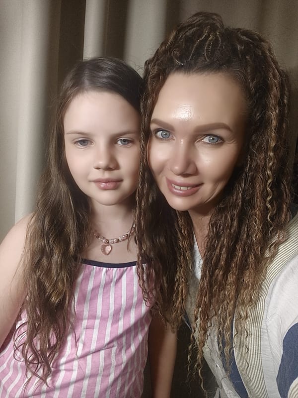 Mother and daughter captured during book reading session